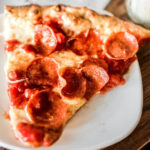 Mustang Pizza business logo